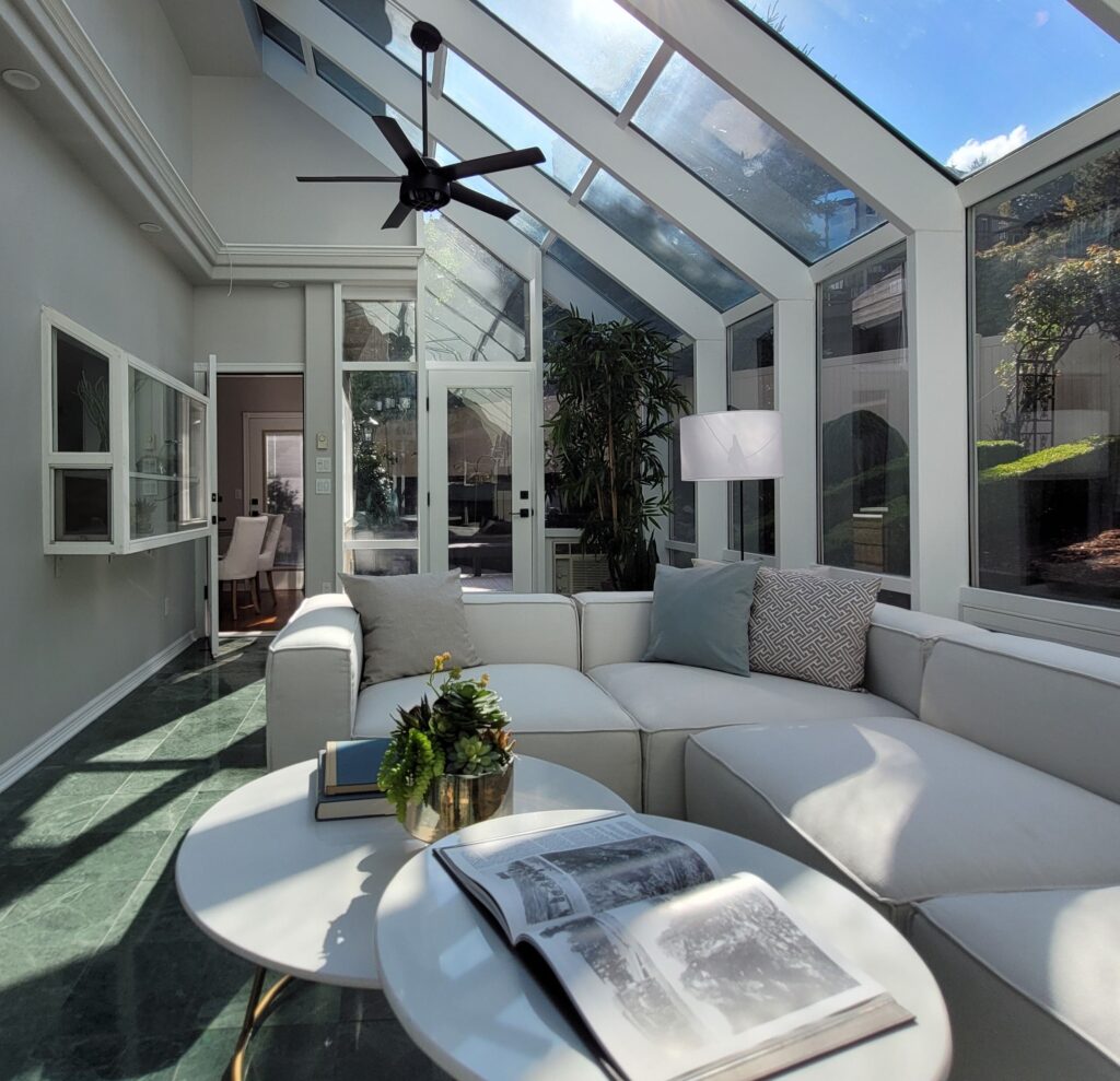 Sunroom with freshly painted walls and white trim
