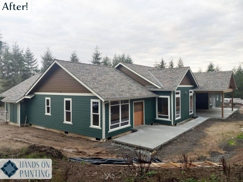 Ranch home with fresh green exterior paint and white trim